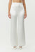 SATIN FLARE TROUSER | POWDER WHITE - THIRD FORM